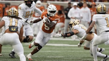 Texas Longhorns running back Quintrevion Wisner (5) rushes against the Vanderbilt Commodores, Nov. 1, 2025 at Darrell K Royal-Texas Memorial Stadium in Austin, Texas.