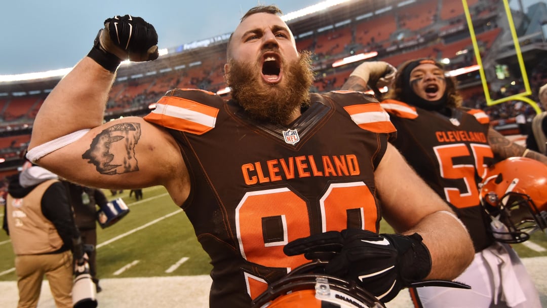 Dec 24, 2016; Cleveland, OH, USA; Cleveland Browns defensive end Jamie Meder (98) and nose tackle Danny Shelton (55) celebrate after the Cleveland Browns beat the San Diego Chargers at FirstEnergy Stadium. The Browns won 20-17. Mandatory Credit: Ken Blaze-USA TODAY Sports