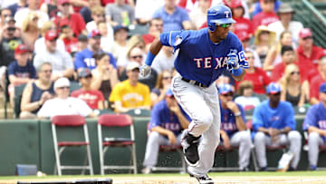 March 25, 2012; Surprise, AZ, USA; Texas Rangers center fielder Julio Borbon (20) at bat against the Los Angeles Angels at the Tempe Diablo Stadium.