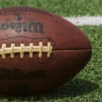 A Tennessee high school football player shocked the crowd when he ran from the bench area to tackle a player who was returning an interception on Friday night.