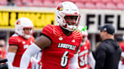 Louisville Cardinals linebacker Stanquan Clark (6) warms up ahead of their game against the Austin Peay Governors on Saturday, Aug. 31, 2024 at L&N Federal Credit Union Stadium in Louisville, Ky.