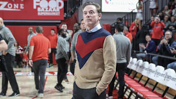 Dec 7, 2024; Queens, New York, USA;  St. John's basketball head coach Rick Pitino wears a sweater in honor of the late Lou Carnesecca against the Kansas State Wildcats at Carnesecca Arena.