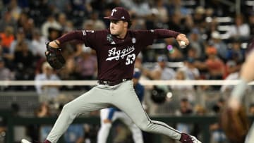 Jun 19, 2024; Omaha, NE, USA;  Texas A&M Aggies pitcher Evan Aschenbeck (53) throws against the Florida Gators during the eighth inning at Charles Schwab Field Omaha. Mandatory Credit: Steven Branscombe-USA TODAY Sports