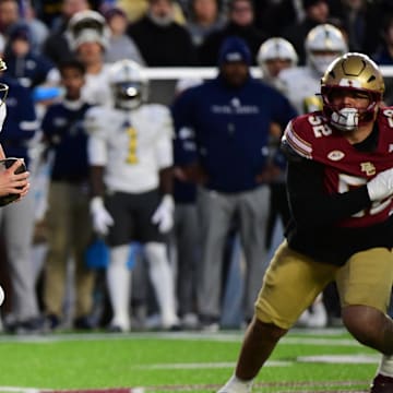 Nov 15, 2025; Chestnut Hill, Massachusetts, USA; Georgia Tech Yellow Jackets quarterback Haynes King (10) runs with the ball during the first half against the Boston College Eagles at Alumni Stadium. Mandatory Credit: Bob DeChiara-Imagn Images