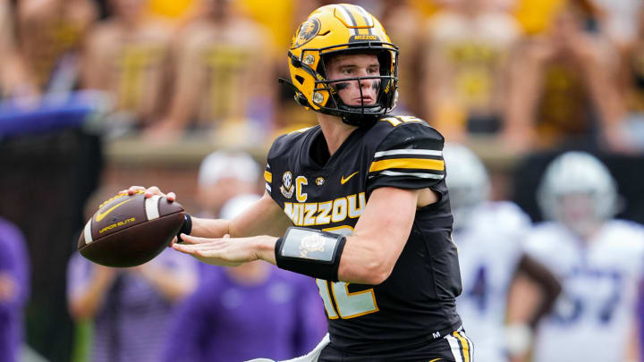 Sep 16, 2023; Columbia, Missouri, USA; Missouri Tigers quarterback Brady Cook (12) throws a pass during the first half against the Kansas State Wildcats at Faurot Field at Memorial Stadium. Mandatory Credit: Jay Biggerstaff-USA TODAY Sports