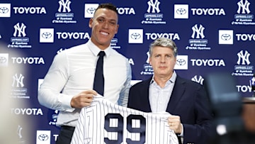 Dec 21, 2022; Bronx, New York, USA; Aaron Judge poses with Hal Steinbrenner during a press conference at Yankee Stadium. Mandatory Credit: Jessica Alcheh-Imagn Images
