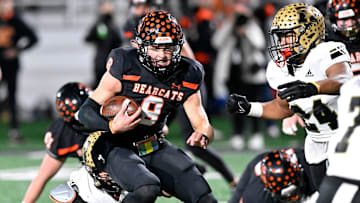 Aledo quarterback Hauss Hejny scrambles with the ball against Abilene High during Friday   s Region I-5A Div. I final in Stephenville Dec. 1, 2023. Final score was 56-21, Aledo.