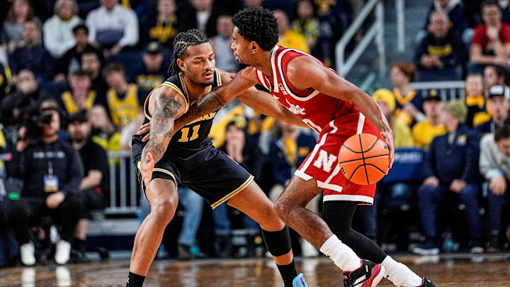Michigan guard Roddy Gayle Jr. (11) defends Nebraska guard Jamarques Lawrence (10) during the first half at Crisler Center in Ann Arbor on Tuesday, Jan. 27, 2026.