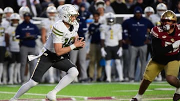 Nov 15, 2025; Chestnut Hill, Massachusetts, USA; Georgia Tech Yellow Jackets quarterback Haynes King (10) runs with the ball during the first half against the Boston College Eagles at Alumni Stadium. Mandatory Credit: Bob DeChiara-Imagn Images