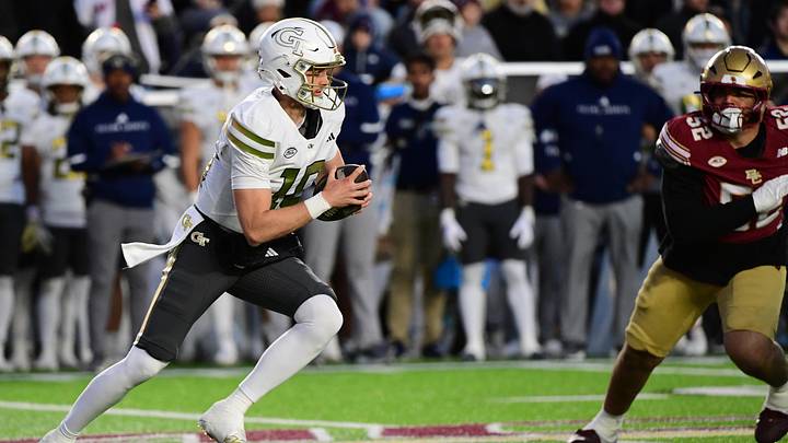 Nov 15, 2025; Chestnut Hill, Massachusetts, USA; Georgia Tech Yellow Jackets quarterback Haynes King (10) runs with the ball during the first half against the Boston College Eagles at Alumni Stadium. Mandatory Credit: Bob DeChiara-Imagn Images
