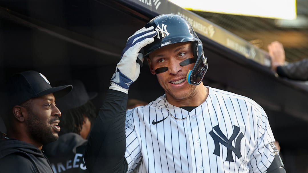 New York Yankees right fielder Aaron Judge (99) celebrates with teammates after hitting a two run home run during the first inning against the Baltimore Orioles at Yankee Stadium.