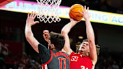 Nebraska's Braxton shoots the ball against Ohio State's Ivan Njegovan during the first half at Pinnacle Bank Arena.