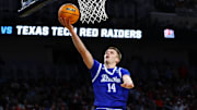 Mar 22, 2025; Wichita, KS, USA; Drake Bulldogs guard Bennett Stirtz (14) shoots the ball against the Texas Tech Red Raiders during the second half at Intrust Bank Arena. Mandatory Credit: Nick Tre. Smith-Imagn Images