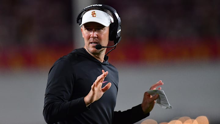 Oct 7, 2023; Los Angeles, California, USA; Southern California Trojans head coach Lincoln Riley watches game action against the Arizona Wildcats during the first half at Los Angeles Memorial Coliseum. Mandatory Credit: Gary A. Vasquez-Imagn Images Oct 7, 2023; Los Angeles, California, USA; Southern California Trojans head coach Lincoln Riley watches game action against the Arizona Wildcats during the first half at Los Angeles Memorial Coliseum. Mandatory Credit: Gary A. Vasquez-Imagn Images