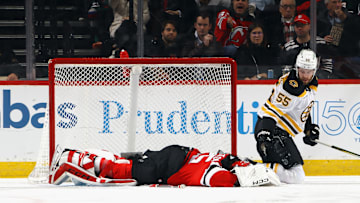 Jacob Markstrom, Justin Brazeau, Boston Bruins v New Jersey Devils