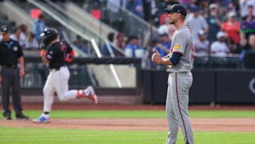 Jul 26, 2024; New York City, New York, USA; Atlanta Braves starting pitcher Charlie Morton (50) looks up after allowing a solo home run to New York Mets catcher Francisco Alvarez (4)  during the third inning at Citi Field. Mandatory Credit: Vincent Carchietta-Imagn Images
