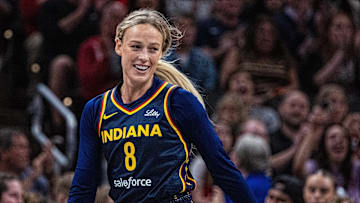 Jun 17, 2025; Indianapolis, Indiana, USA; Indiana Fever guard Sophie Cunningham (8) in the second half against the Connecticut Sun at Gainbridge Fieldhouse. Mandatory Credit: Trevor Ruszkowski-Imagn Images