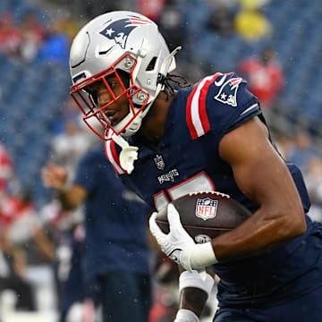 Aug 10, 2023; Foxborough, Massachusetts, USA; New England Patriots tight end Scotty Washington (17) warms up before a game against the Houston Texans at Gillette Stadium. Mandatory Credit: Eric Canha-Imagn Images
