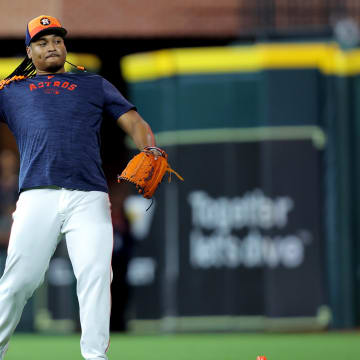 Jul 28, 2024; Houston, Texas, USA; Houston Astros starting pitcher Luis Garcia (77) works out prior to the game against the Los Angeles Dodgers at Minute Maid Park.