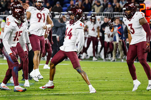 Virginia Tech CB Dorian Strong celebrates an interception with teammates during the second half of the game against Duke. Virginia Tech CB Dorian Strong celebrates an interception with teammates during the second half of the game against Duke.