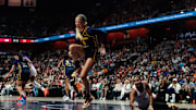 Aug 17, 2025; Uncasville, Connecticut, USA; Indiana Fever guard Sophie Cunningham (8) is injured on a play against Connecticut Sun guard Bria Hartley (14) in the first half at Mohegan Sun Arena. Mandatory Credit: David Butler II-Imagn Images