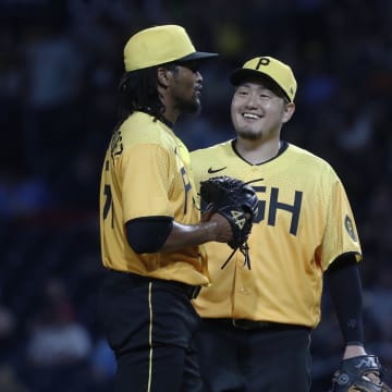 Jul 28, 2023; Pittsburgh, Pennsylvania, USA;  Pittsburgh Pirates relief pitcher Jose Hernandez (left) and first baseman Ji Man Choi (91) react against the Philadelphia Phillies during the seventh inning at PNC Park. The Phillies won 2-1. Mandatory Credit: Charles LeClaire-USA TODAY Sports
