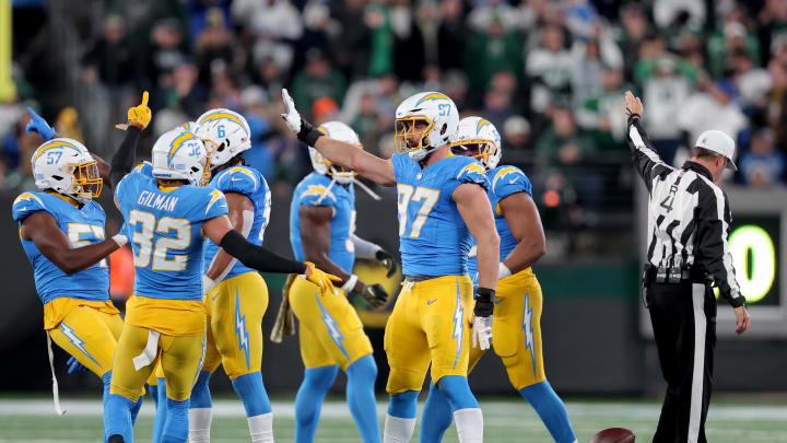 Nov 6, 2023; East Rutherford, New Jersey, USA; Los Angeles Chargers linebacker Joey Bosa (97) celebrates with teammates after recovering a New York Jets fumble during the first quarter at MetLife Stadium. Mandatory Credit: Brad Penner-USA TODAY Sports