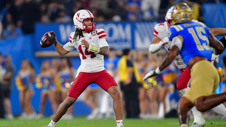 Nov 8, 2025; Pasadena, California, USA; Nebraska Cornhuskers quarterback TJ Lateef (14) throws against the UCLA Bruins during the second half at the Rose Bowl. Mandatory Credit: Gary A. Vasquez-Imagn Images