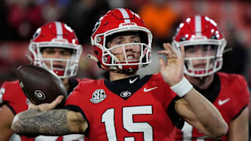 Georgia quarterback Carson Beck (15) warms up before the start of a NCAA college football game against Georgia Tech in Athens, Ga., on Friday, Nov. 29, 2024.