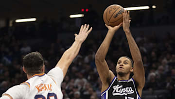 November 13, 2024; Sacramento, California, USA; Sacramento Kings forward Keegan Murray (13) shoots the basketball against Phoenix Suns center Jusuf Nurkic (20) during the second quarter at Golden 1 Center. Mandatory Credit: Kyle Terada-Imagn Images