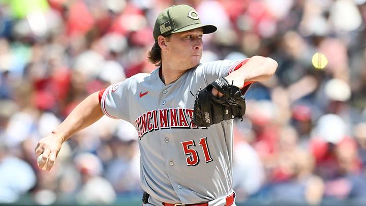 Cincinnati Reds pitcher Brady Singer (51) throws a pitch
