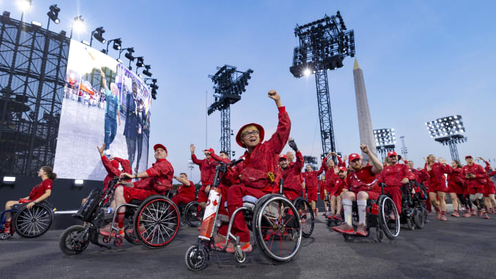 Aug 28, 2024; Paris, France; Athletes from Canada celebrate as they take part in the Parade of Athletes during the Opening Ceremony of the Paris 2024 Paralympic Summer Games at Place de la Concorde. Mandatory Credit: OIS/Lillie Yazdi via USA TODAY Sports