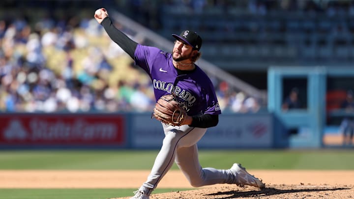 Los Angeles, California, USA; Colorado Rockies relief pitcher Jeff Criswell (46) pitches during the sixth inning against the Los Angeles Dodgers at Dodger Stadium. Los Angeles, California, USA; Colorado Rockies relief pitcher Jeff Criswell (46) pitches during the sixth inning against the Los Angeles Dodgers at Dodger Stadium.