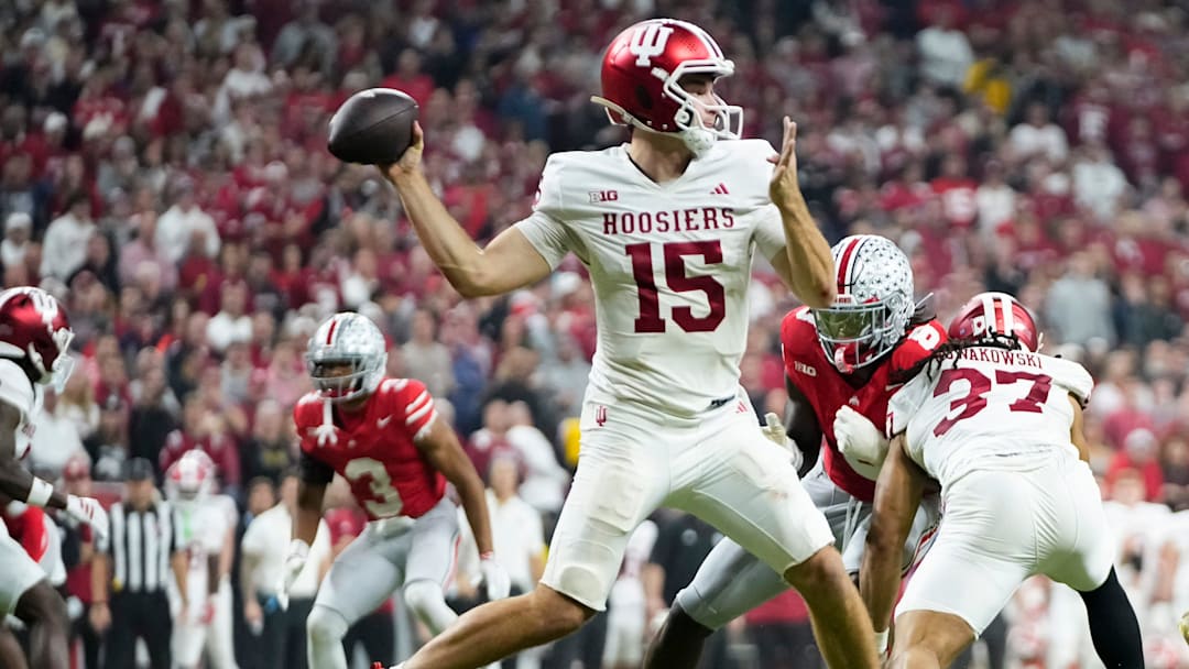 Indiana Hoosiers quarterback Fernando Mendoza (15) throws during the first half of the Big Ten Conference championship game against the Ohio State Buckeyes at Lucas Oil Stadium in Indianapolis on Dec. 6, 2025.