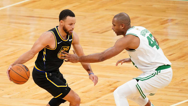 Jun 10, 2022; Boston, Massachusetts, USA; Boston Celtics center Al Horford (42) defends Golden State Warriors guard Stephen Curry (30) during the fourth quarter of game four in the 2022 NBA Finals at the TD Garden. Mandatory Credit: David Butler II-Imagn Images