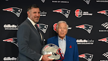 Jan 13, 2025; Foxborough, MA, USA; Mike Vrabel (left) poses for a photo with New England Patriots owner Robert Kraft (right) after a press conference at Gillette Stadium to introduce him as the Patriots new head coach. Mandatory Credit: Eric Canha-Imagn Images