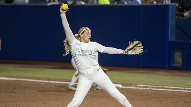 Oregon Ducks pitcher Lyndsey Grein (33) throws a pitch in the second inning against the Ole Miss Rebels during the NCAA Softb