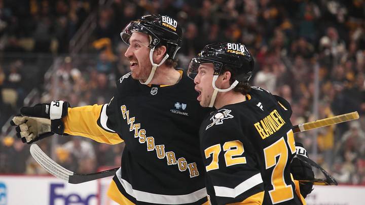 Feb 4, 2025; Pittsburgh, Pennsylvania, USA;  Pittsburgh Penguins left wing Anthony Beauvillier (72) and right wing Kevin Hayes (13) celebrate a goal by Hayes against the New Jersey Devils during the third period at PPG Paints Arena. Mandatory Credit: Charles LeClaire-Imagn Images