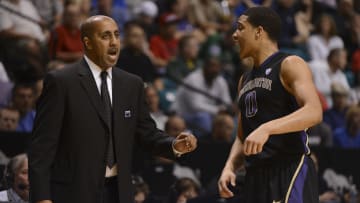 Abdul Gaddy and UW coach Lorenzo Romar confer during the 2013 Pac-12 tournament. 