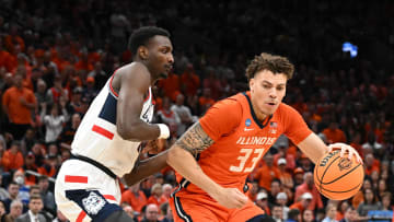 Mar 30, 2024; Boston, MA, USA; Illinois Fighting Illini forward Coleman Hawkins (33) dribbles the ball against the Connecticut Huskies in the finals of the East Regional of the 2024 NCAA Tournament at TD Garden. Mandatory Credit: Brian Fluharty-USA TODAY Sports