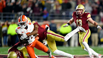 Nov 10, 2018; Chestnut Hill, MA, USA; Clemson Tigers cornerback A.J. Terrell (8) is tackled by Boston College Eagles defensive back Lukas Denis (21) during the first half at Alumni Stadium. Mandatory Credit: Brian Fluharty-Imagn Images