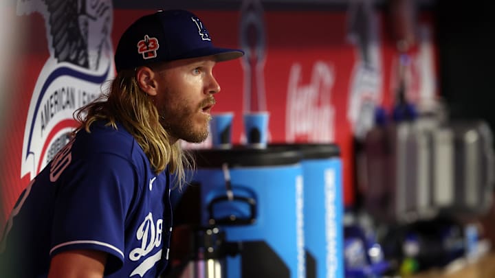 Mar 27, 2023; Anaheim, California, USA;  Los Angeles Dodgers starting pitcher Noah Syndergaard (43) watches the game against the Los Angeles Angels from the dugout at Angel Stadium. 
