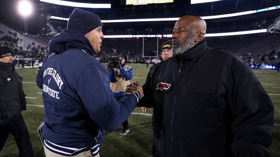 Penn State Nittany Lions head coach James Franklin shakes hands at midfield with Maryland Terrapins head coach Mike Locksley.