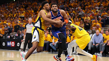 Tony Bradley ties up Karl-Anthony Towns in New York Knicks v Indiana Pacers - Game 3