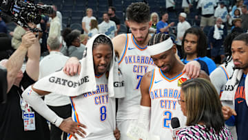 May 26, 2025; Minneapolis, Minnesota, USA; Oklahoma City Thunder forward Jalen Williams (8), forward Chet Holmgren (7) and guard Shai Gilgeous-Alexander (2) talk to the media after defeating the Minnesota Timberwolves in game four of the western conference finals for the 2025 NBA Playoffs at Target Center. Mandatory Credit: Jesse Johnson-Imagn Images