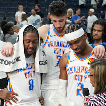 May 26, 2025; Minneapolis, Minnesota, USA; Oklahoma City Thunder forward Jalen Williams (8), forward Chet Holmgren (7) and guard Shai Gilgeous-Alexander (2) talk to the media after defeating the Minnesota Timberwolves in game four of the western conference finals for the 2025 NBA Playoffs at Target Center. Mandatory Credit: Jesse Johnson-Imagn Images