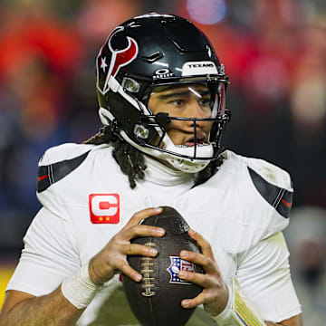 Jan 18, 2025; Kansas City, Missouri, USA; Houston Texans quarterback C.J. Stroud (7) drops back to pass during the second half against the Kansas City Chiefs in a 2025 AFC divisional round game at GEHA Field at Arrowhead Stadium. Mandatory Credit: Jay Biggerstaff-Imagn Images