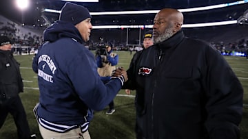 Penn State Nittany Lions head coach James Franklin (left) shakes hands at midfield with Maryland Terrapins head coach Michael Locksley 