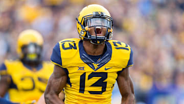 Oct 1, 2016; Morgantown, WV, USA; West Virginia Mountaineers cornerback Rasul Douglas (13) reacts after making a tackle during the first quarter against the Kansas State Wildcats.