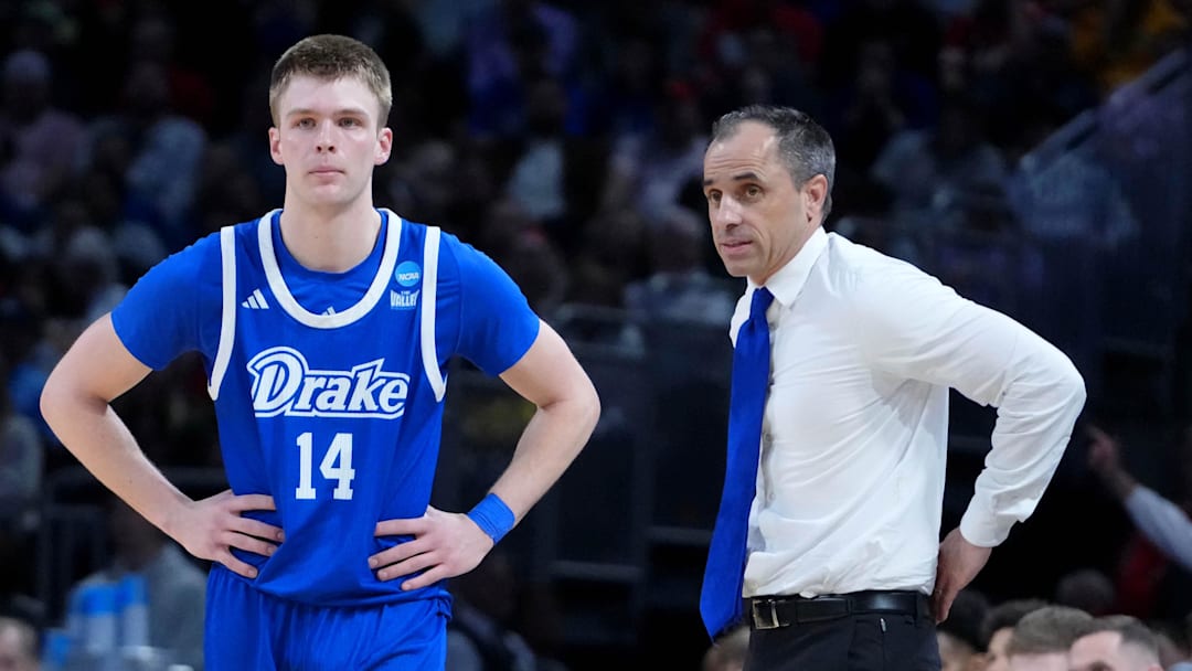 Mar 22, 2025; Wichita, KS, USA; Drake Bulldogs guard Bennett Stirtz (14) talks with head coach Ben McCollum during the second half at Intrust Bank Arena. Mandatory Credit: Kirby Lee-Imagn Images